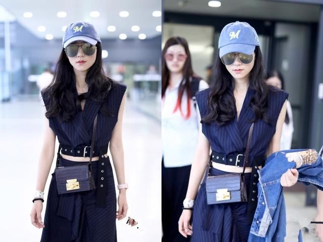 韩雪难得穿露腰装现身，还要用包包挡住，网友：露一点不要紧！