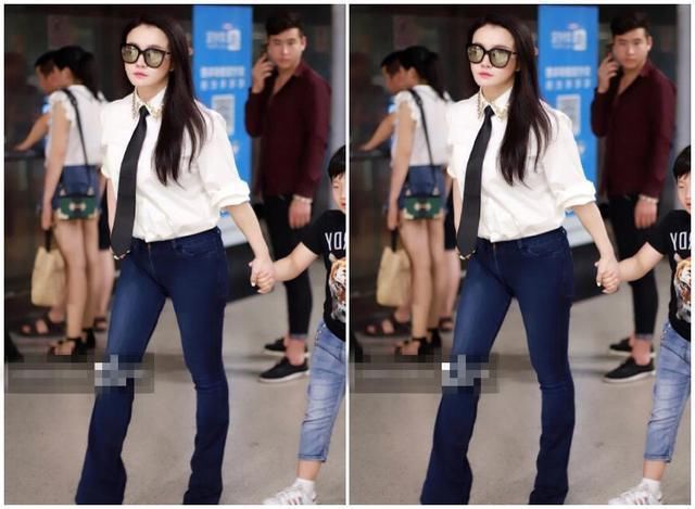 冉莹颖用力过猛，紧身牛仔喇叭裤不是一般的紧，网友:不难受吗?