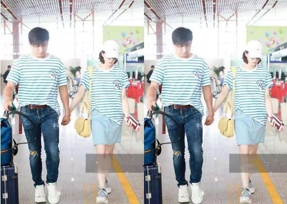 48岁吴奇隆与31岁刘诗诗少见机场秀恩爱，网友：17岁的差距还真大