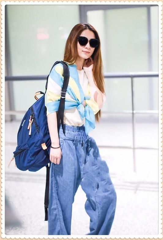 本以为Hebe把丝巾当披肩够时髦了，可看到周迅的穿法，我沉默了！