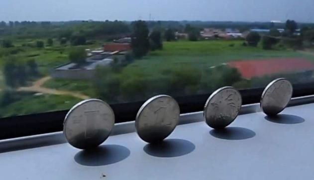 中国高铁立硬币只是传说？日本表示粘了胶水，美国游客站了出来