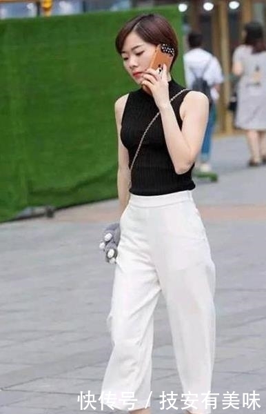  「气质」街拍美女：身材曼妙的小姐姐，搭配吊带连衣裙，性感魅力十足！