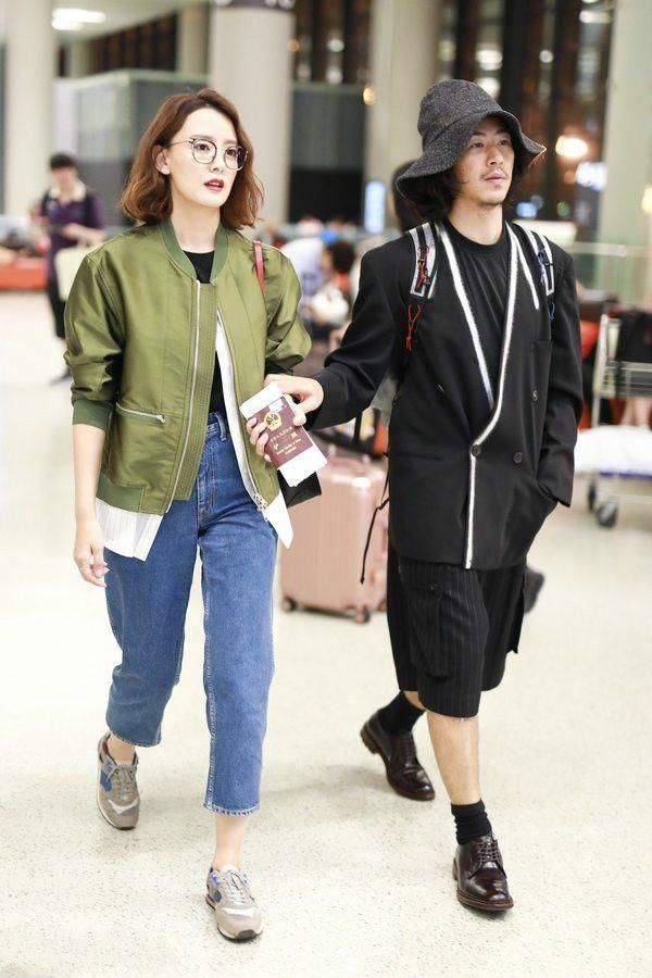 周奇奇江奇霖长袖长裤现身机场，网友：宫羽姑娘，你是真不怕热呀