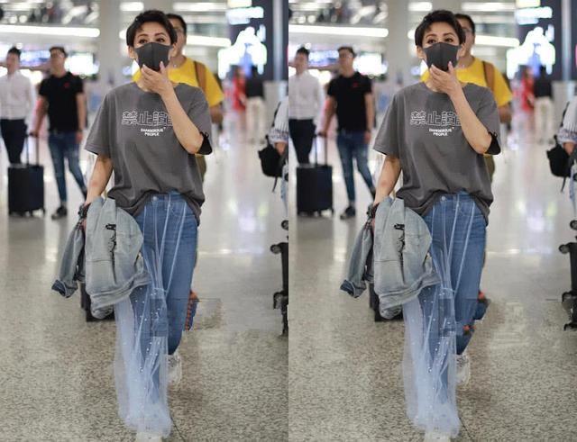 46岁宁静真会玩透明裙里还套条紧身牛仔网友难怪小11岁男友看上她