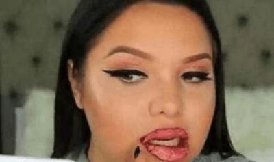 女子作死在嘴巴上涂100层口红, 张嘴的那一刻女子疼的吸凉气！