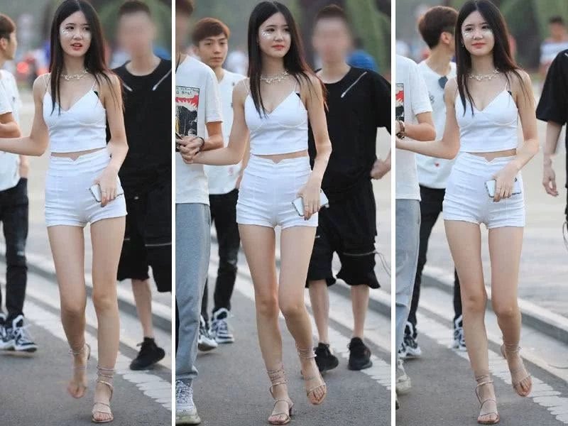 气质小姐姐穿白色套装，吊带衣的性感，热裤的紧绷，每一样都美的