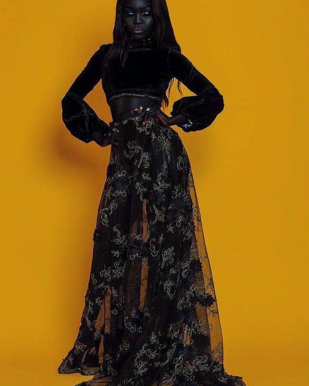 黑人女子肤色纯黑不惧嘲笑，坚持做模特，被人称黑夜女王！