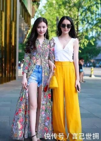 【 更是】小姐姐身材高挑，黑色的高跟凉鞋更是增添了妩媚女人味，路人街拍