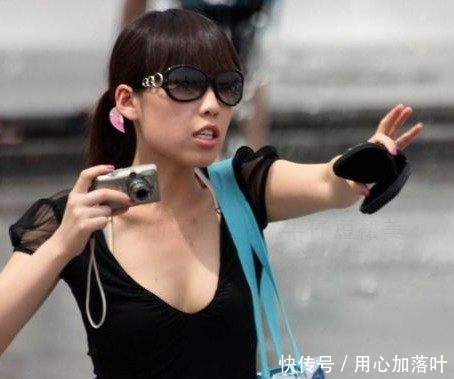 街拍长发墨镜时尚气质美女,若隐若现的透视装给人无限遐想