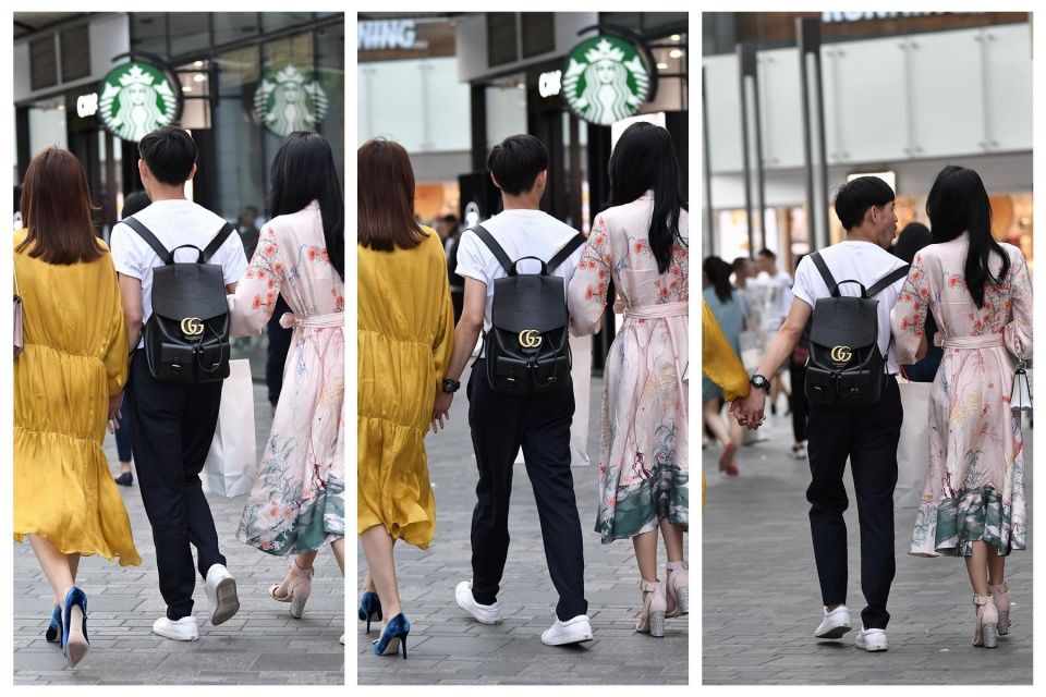 小伙子带着两位时尚长裙的姑娘，哪一位是他的女友呢?