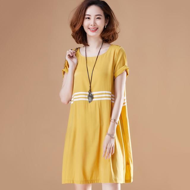 如果妈妈身材微胖，就给她穿文艺裙，看着好看，穿着显瘦