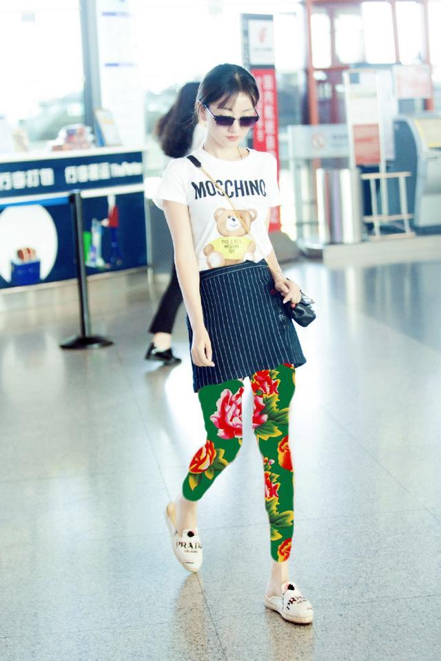 37岁杨蓉现身机场，本尊比电视还上还美，可大家注意力都在腿