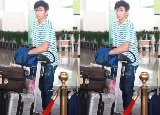 48岁吴奇隆与31岁刘诗诗少见机场秀恩爱，网友：17岁的差距还真大