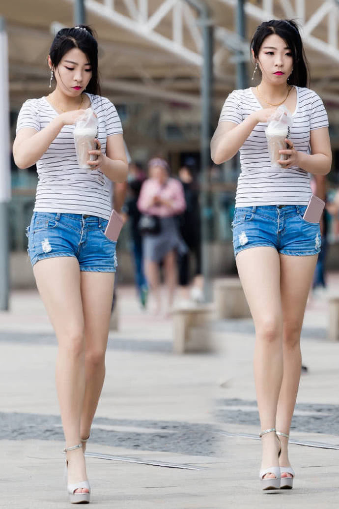 小姐姐穿热露修长美腿，还穿一双15公分的高跟鞋，真的不嫌腿长！