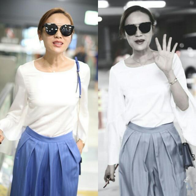 叶一茜机场终于换风格了,穿百褶阔腿裤气场开挂,早该这样穿了!