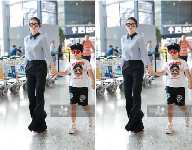 34岁冉莹颖用力过猛!衬衣喇叭裤凹造型真时髦，网友:裤脚怎么了