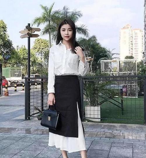  『风衣』养眼女神街拍：丹唇外朗的美女，一件黑色连衣裙外搭卡其色风衣，魅力十足