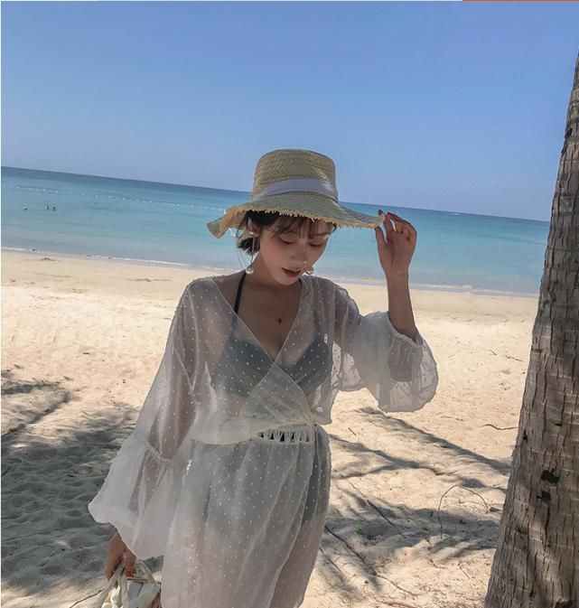 仙气的海滩装，不过美女超模拍照的地方也太美了，原来是在这里