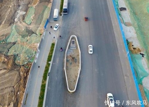  「马路」中国最霸气钉子户，立在马路中央占了道路三分之一，就