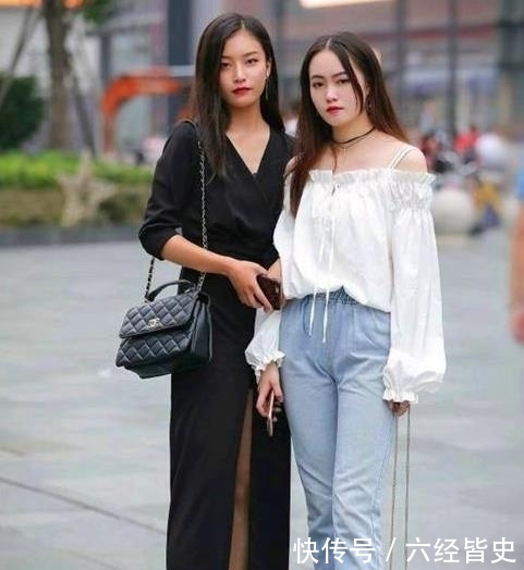 「美女」街拍:秀外慧中的美女,一件黑色背心配打底裤,时尚运动活力气质