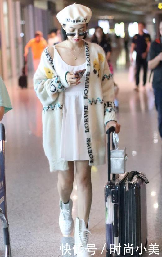 宋茜现身机场,1万多开衫时髦吸睛,2万5行李箱毫无隐私可言
