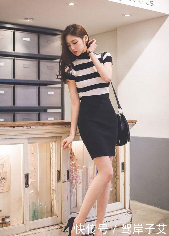 # 位小姐姐#一件黑色修身短裙，尽显完美性感好身材，街拍美艳动人的小姐姐
