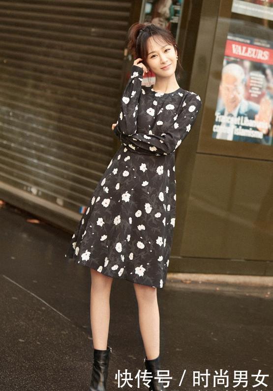 杨紫一身黑现机场，与身旁帅哥亲密耳语，网友：秦俊杰知道吗？