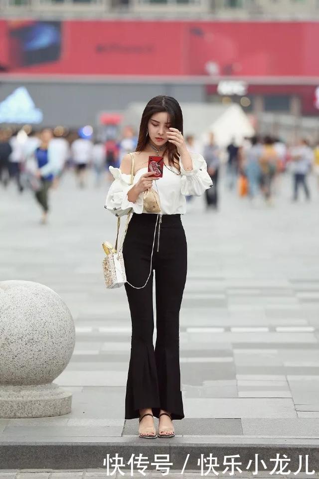 「女人味」街拍：一双亮色的尖头高跟鞋，让她走起路来地姿态也显得更加的有女人味