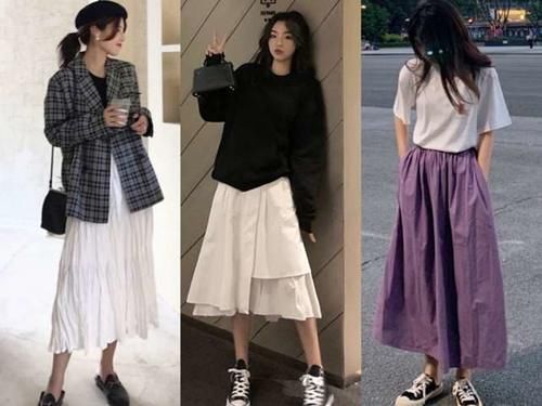 「设计是很」女生别傻乎乎整天穿裤子了,仙女都爱搭“过膝裙”,显瘦还时髦