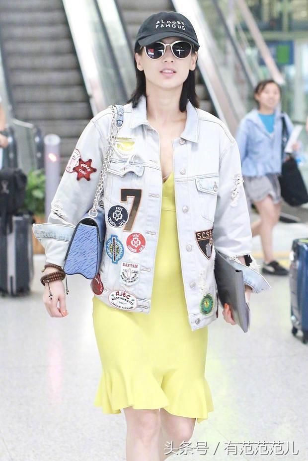 黄圣依的吊带裙内衣都裹不严，幸亏有外套遮住，网友：辣妈也疯狂