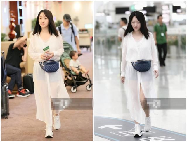 47岁杨钰莹一身白衣藏热裤，笑靥如花甜美少女风，网友:美成20岁