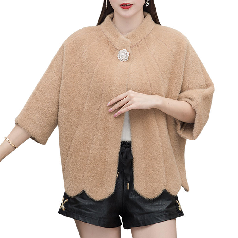 膝盖怕受凉的女人有福了，穿上这针织外套!保暖还美嫩