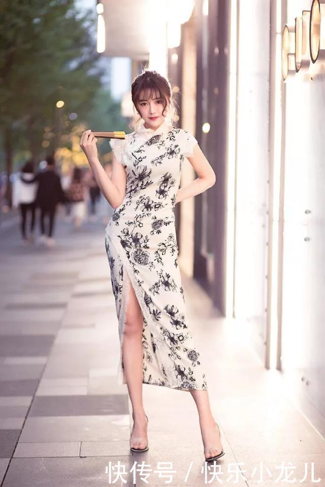 性感@街拍:美女一身旗袍搭配高跟鞋,让双腿若隐若现更加性感,美的无可方物