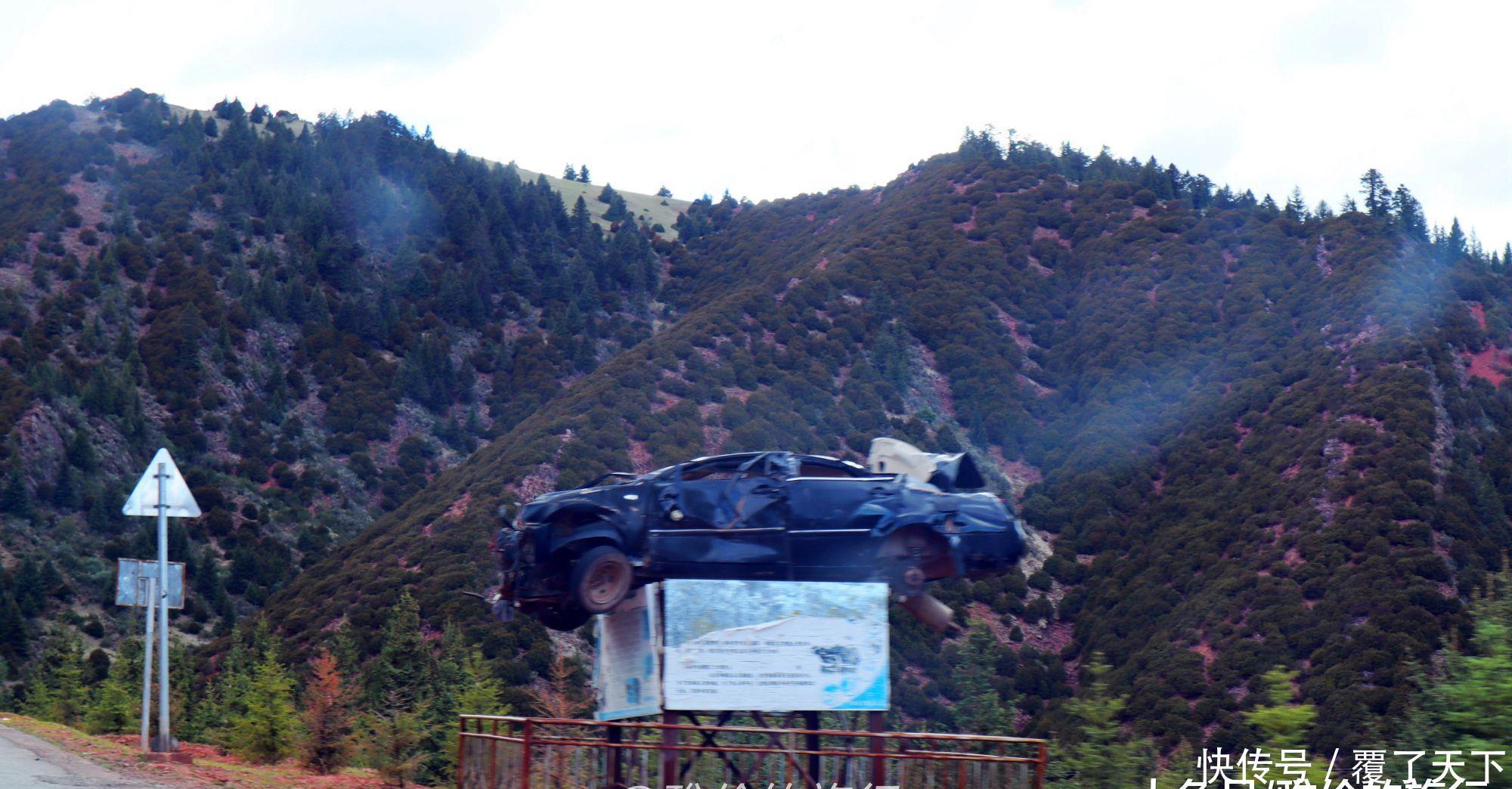 自驾318川藏线有多危险?路边的汽车残骸被高高挂起,像在拍电影