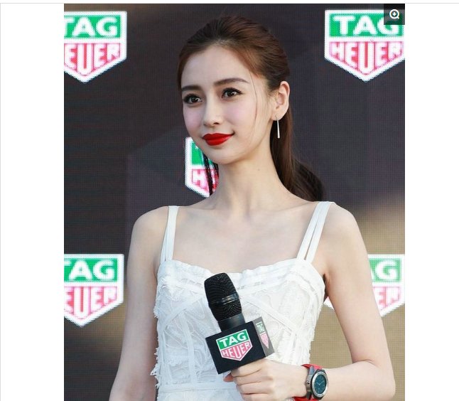 Angelababy穿白色吊带长裙亮相活动，飘逸灵动尽展女神风采