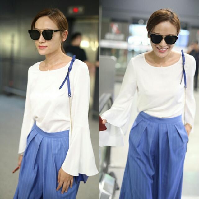 叶一茜机场终于换风格了,穿百褶阔腿裤气场开挂,早该这样穿了!