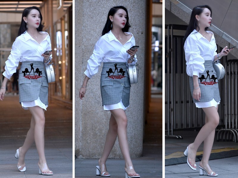 小姐姐将小西服当做裙子穿，恐怕就只有你才穿的这么有型了！