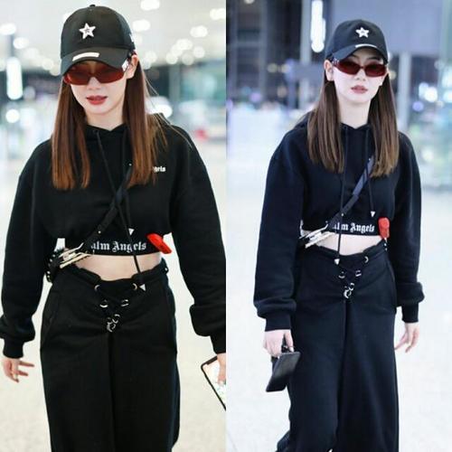 戚薇机场也开始秀腰了，一条大粗裤子裤腰却这么紧，穿的真叫酷