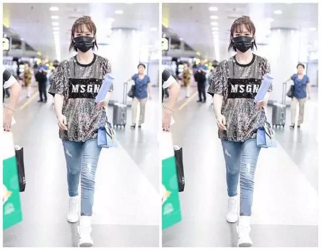 杨紫机场耐心给粉丝签名，这个动作，莫非是迎面走来了张一山