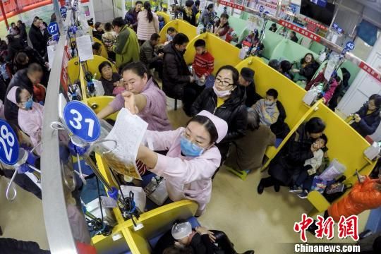 北方多地入冬降雪稀少 流感患儿扎堆