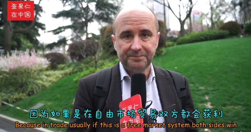 街采外国人:中美贸易战谁会赢?