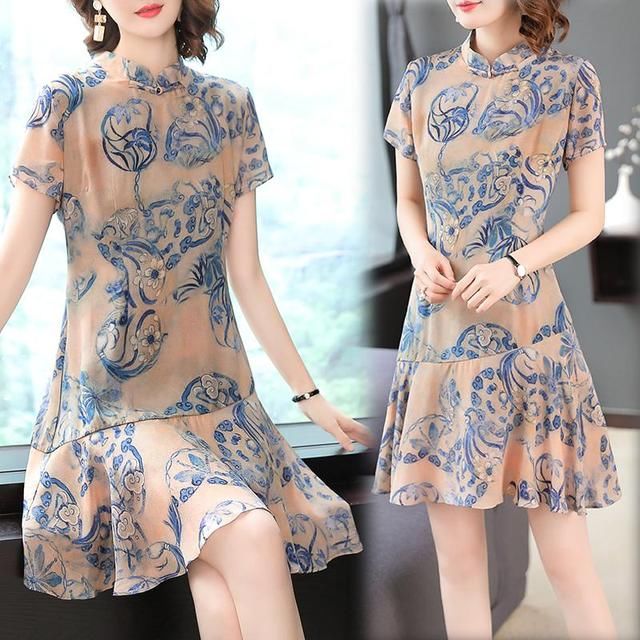 今年48岁的我，去泰国旅游，穿这样旗袍，美的其他团友羡慕眼红