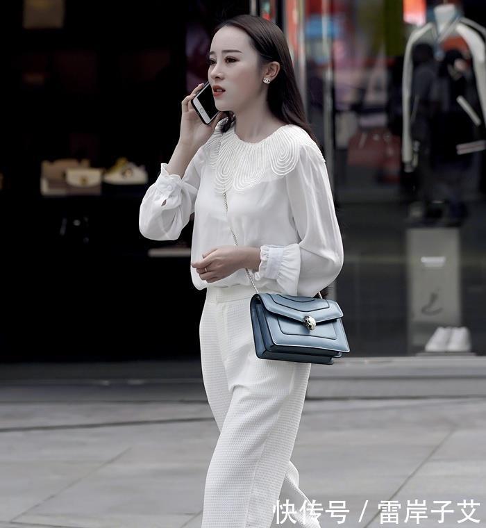  [凸显]街拍：橘色毛衣搭配A字裙的小姐姐，凸显腿长的基本搭配