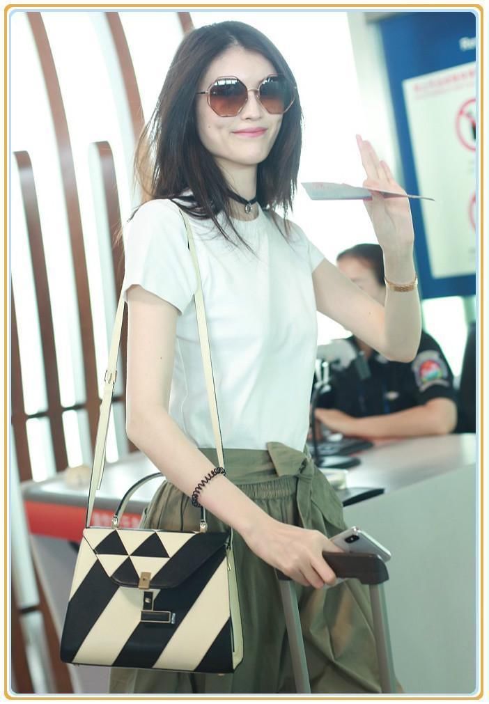 当168张钧宁和178何穗同穿绿色阔腿裤，才知道超模腿真的不好惹