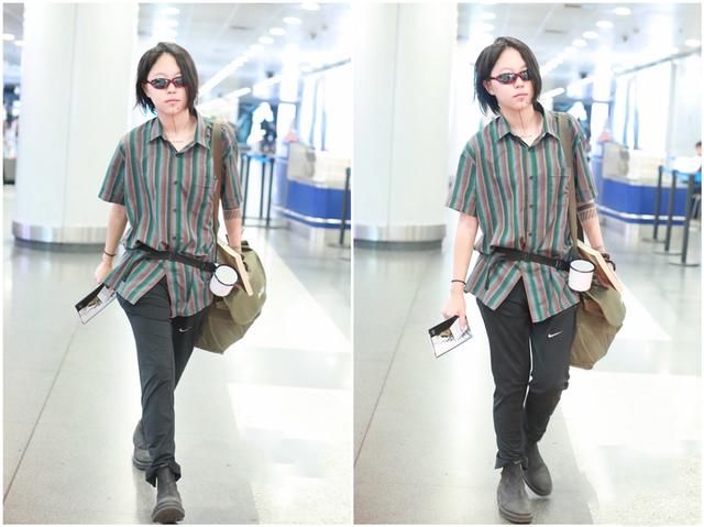 这种时尚你懂吗？窦靖童机场腰间挂水杯超个性，竟如此接地气