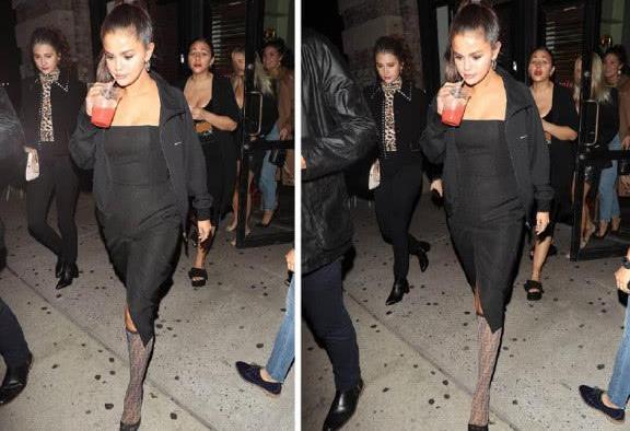 赛琳娜前往时装周，穿开叉裙好性感，不去看秀先去餐厅喝果汁？