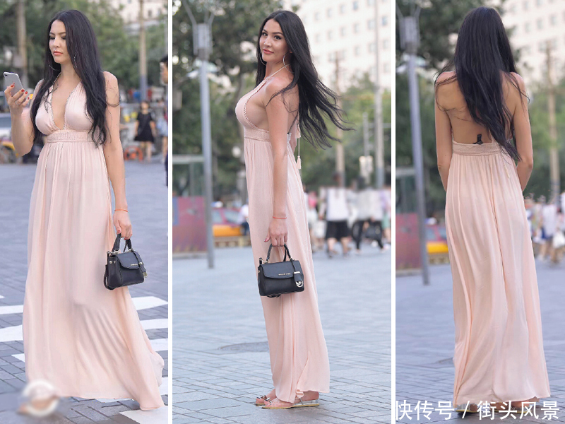 气质小姐姐，身穿肉色深V连衣长裙，昂首挺胸的姿态自信满满！