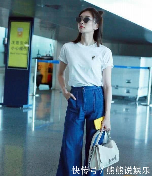 周迅出发巴黎高定时装周，白T恤搭阔腿裤，简单搭配穿出时髦感！