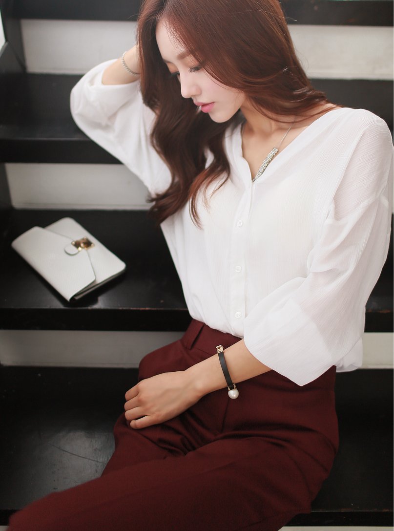 思念，在悠悠岁月里悄悄沉淀;执著，在遥遥守望中风化成石