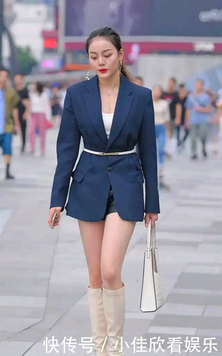  「美女」街拍，春季里的靓装美女，一双时髦长靴简约中透出时尚感
